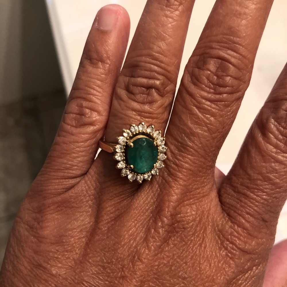 emerald ring set in diamond 14 karat gold